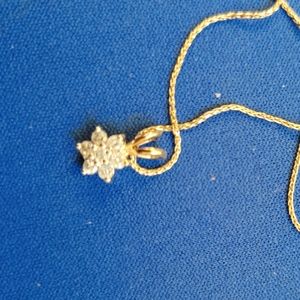 Gold and diamonds necklace and pendant